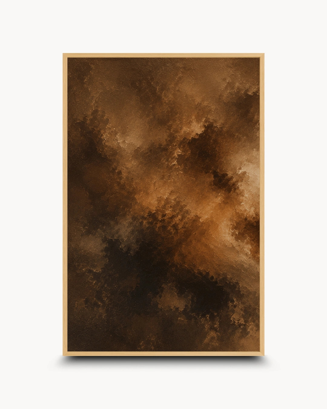 A framed abstract art print featuring a dramatic, textured composition of dark brown, black, and warm golden-brown cloud-like forms, presented on a clean white background with a subtle drop shadow.
