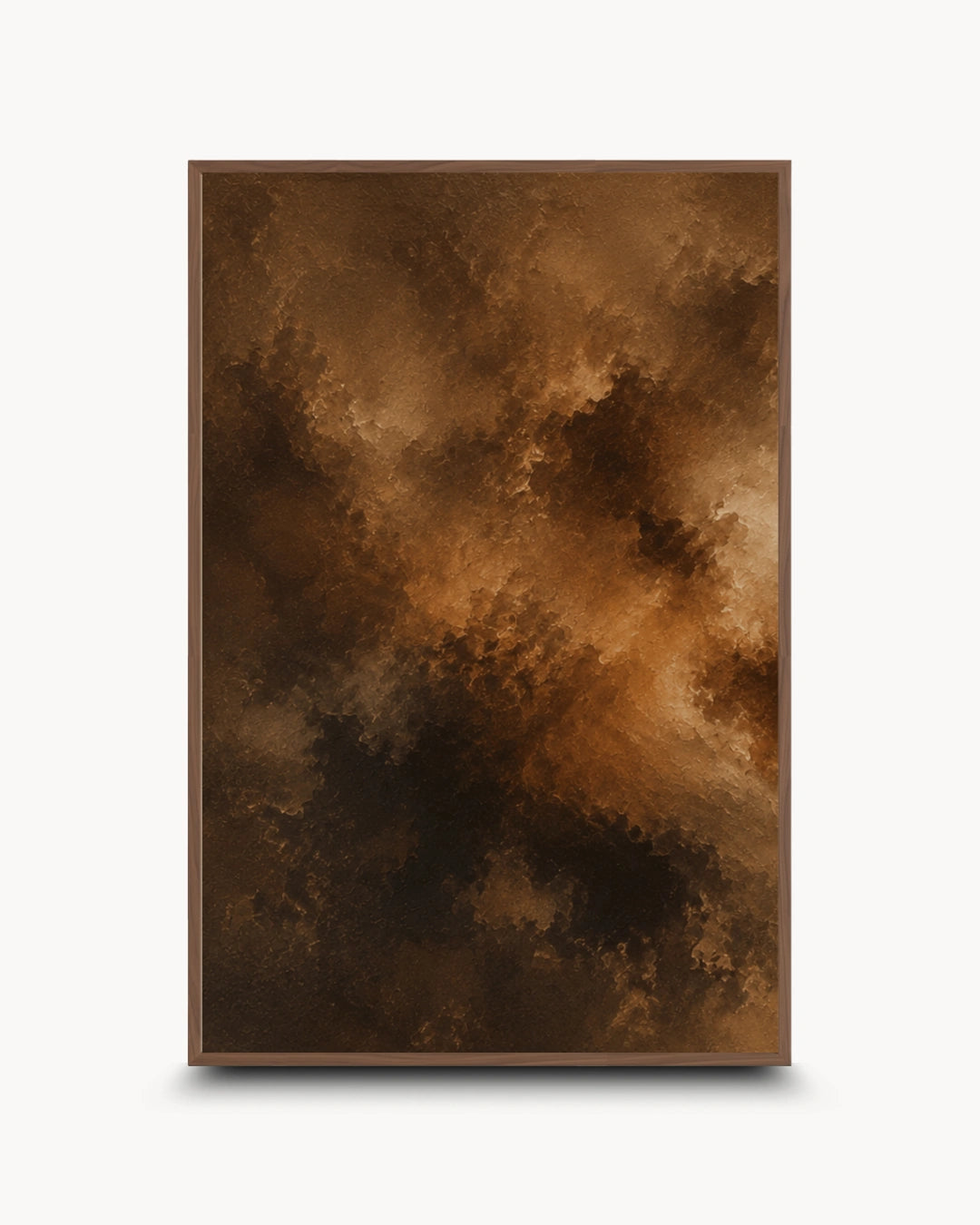 A framed abstract art print featuring a dramatic, textured composition of dark brown, black, and warm golden-brown cloud-like forms, presented on a clean white background with a subtle drop shadow.