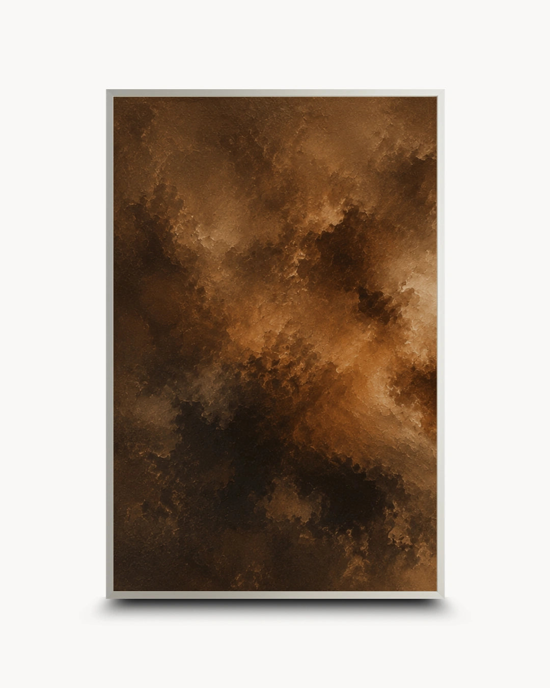 A framed abstract art print featuring a dramatic, textured composition of dark brown, black, and warm golden-brown cloud-like forms, presented on a clean white background with a subtle drop shadow.