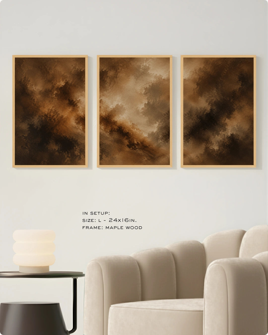 Three vertical framed abstract wall art prints in warm brown and gold tones, displayed above a cream sofa in a modern living room setting.