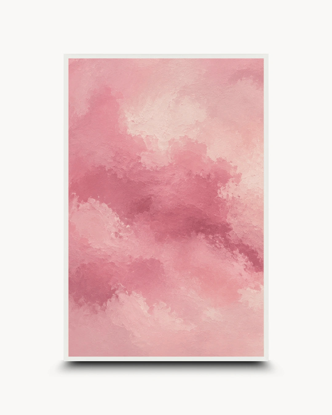 A vertical framed art print featuring a soft pink watercolor cloud pattern, displayed against a clean white background with a subtle drop shadow.