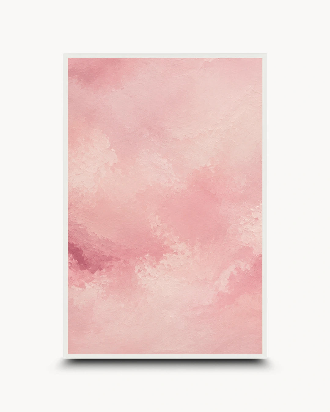 A vertical framed art print featuring a soft pink watercolor texture with subtle tonal variations, displayed against a clean white background with a drop shadow.