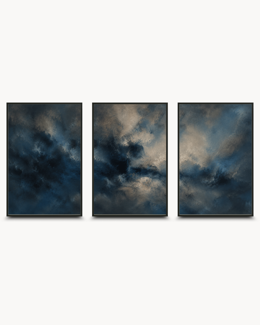 A three-panel framed wall art set featuring dramatic dark blue and gray cloudy imagery, displayed against a light gray background.
