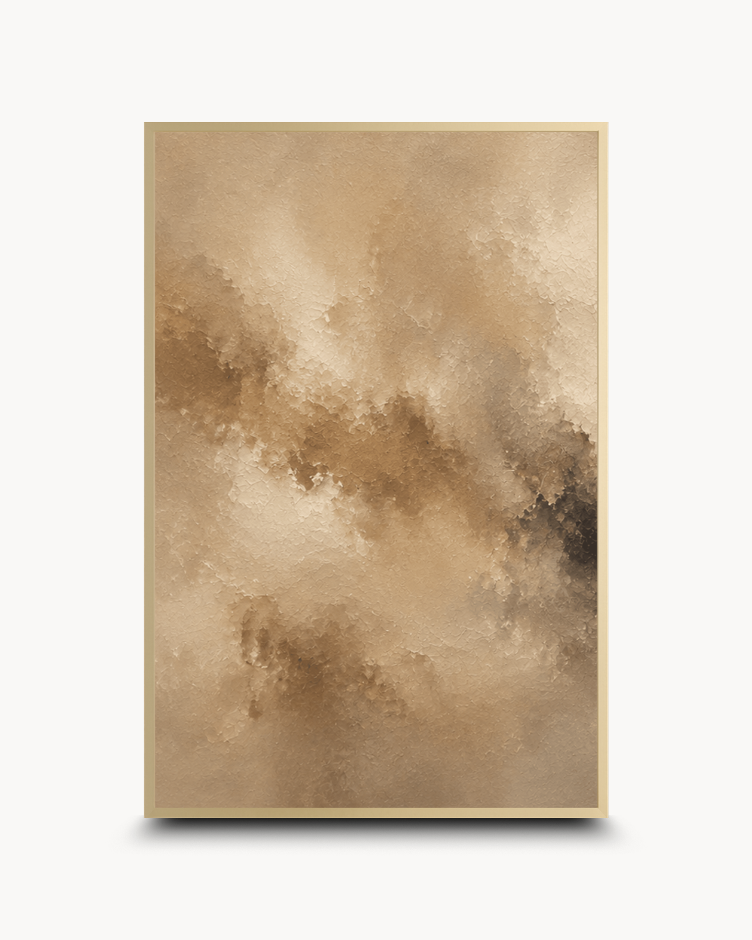 A vertical framed abstract art print featuring a textured, fluid composition in warm beige, tan, and brown tones with a thin gold-toned frame, shown against a clean white background.