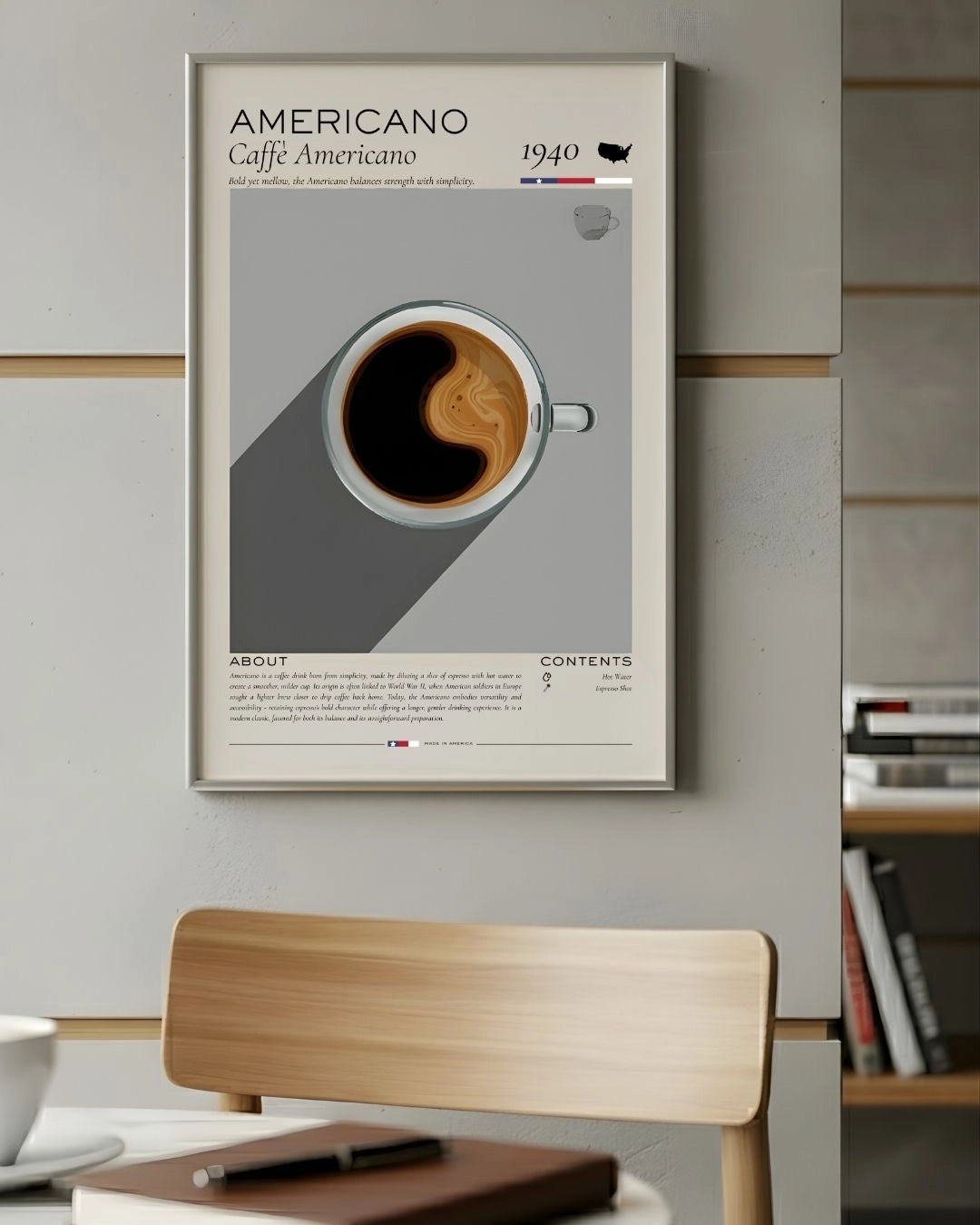 Minimalist Americano coffee infographic poster by K2C Co. in a sleek Satin Silver frame, styled in a modern home office or study corner with a wooden chair and notebook.