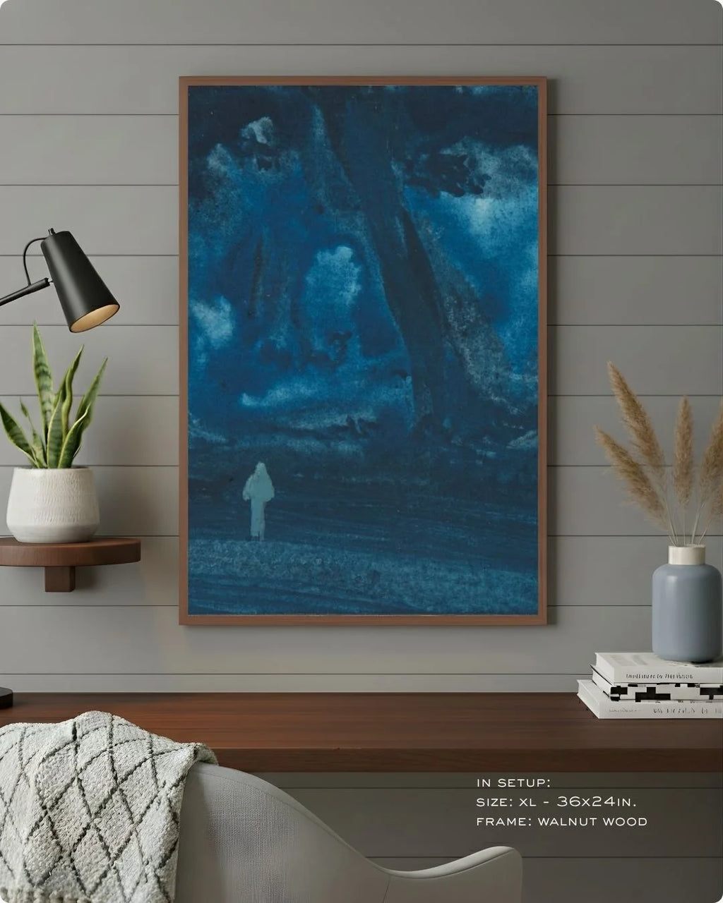 Bireswar Das "The Eternal Peaks" in a warm Walnut Wood frame by K2C Co., styled against a grey wood-paneled wall for a moody, professional executive look.