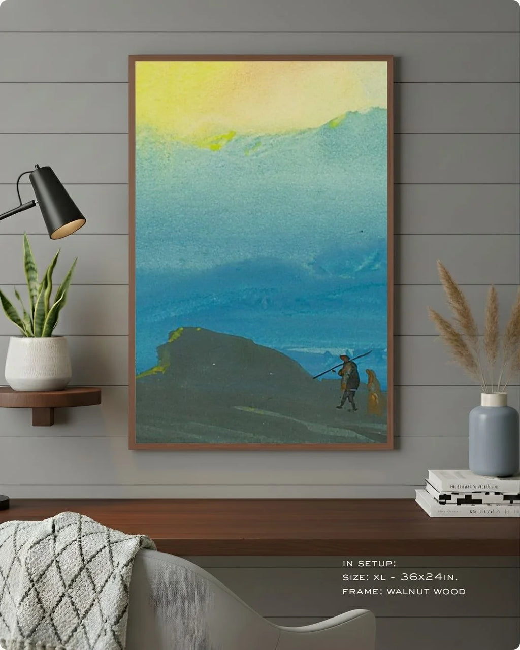 Bireswar Das "The Mountains of Gold" in a warm Walnut Wood frame by K2C Co., styled against a grey wood-paneled wall for a sophisticated, executive look.