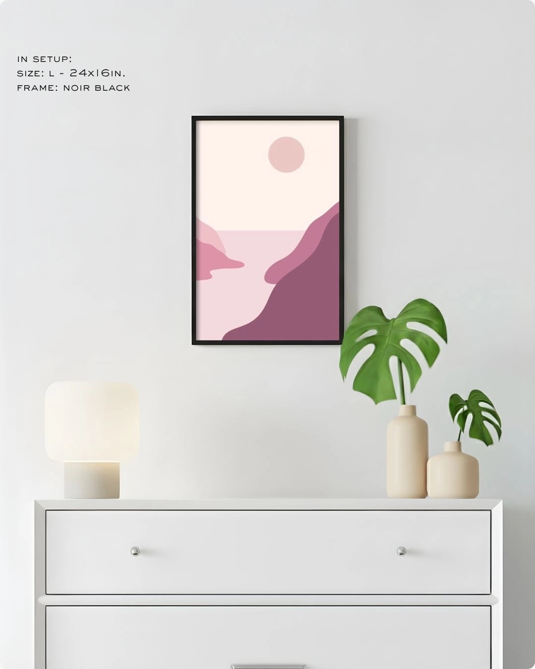 Large (Size L) Blush Valley abstract landscape print by K2C Co. in a Noir Black frame, styled in a minimalist home setup above a white chest of drawers.