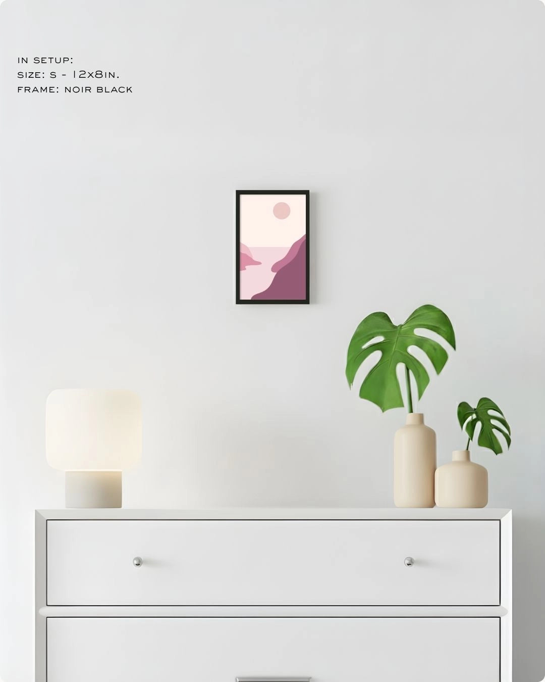 Small (Size S) Blush Valley minimalist landscape print by K2C Co. in a Noir Black frame, displayed on a bedroom wall above a white dresser for small-space styling.