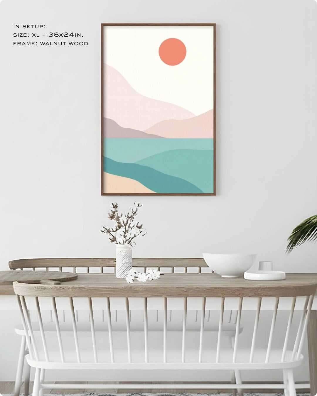 K2C Co. Coastal Serenity abstract landscape artwork in a Walnut Wood frame, displayed in a bright modern dining room setting with minimalist white furniture.