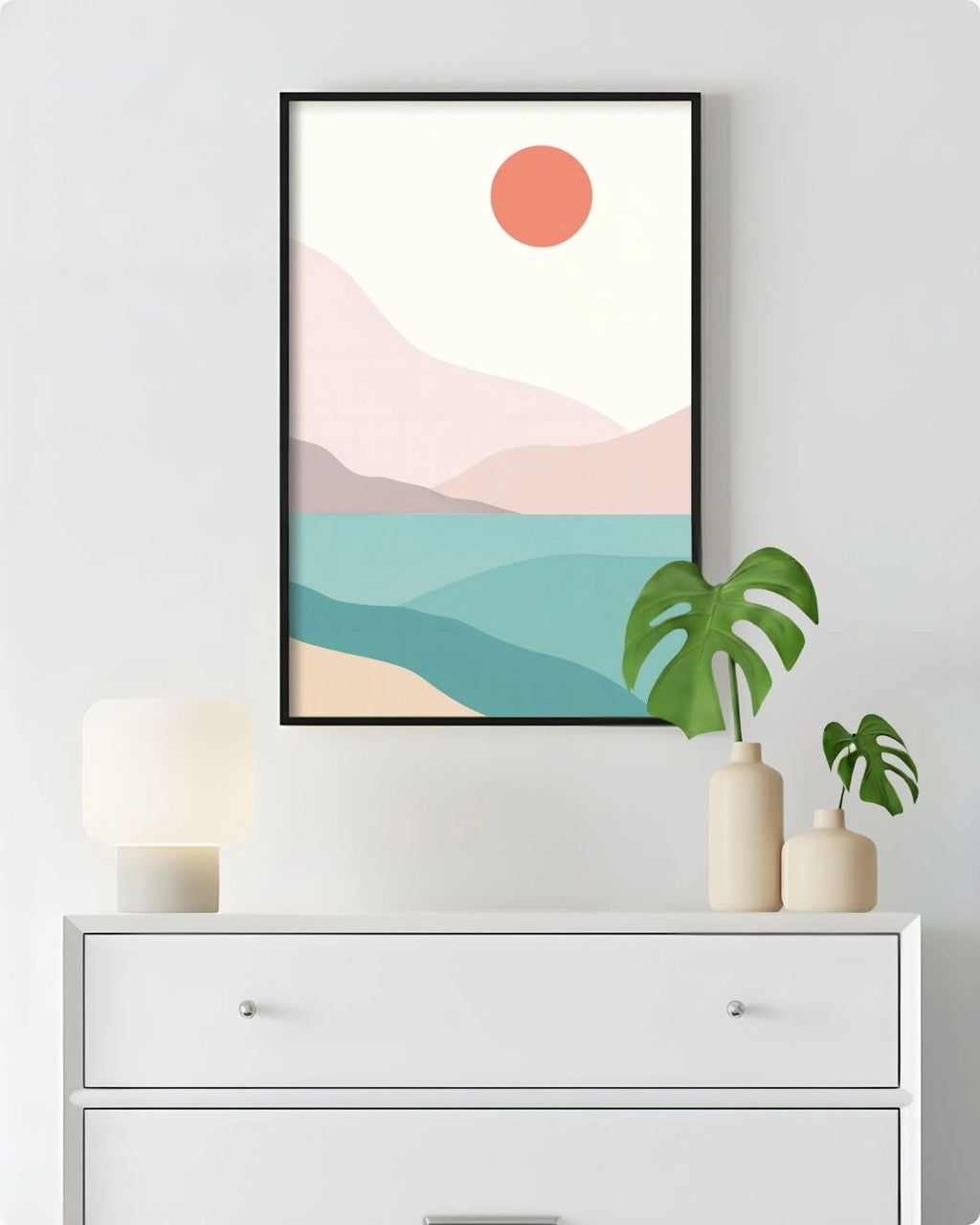 Extra Large (XL) Coastal Serenity landscape wall art by K2C Co. in a Noir Black frame, hanging above a white dresser in a clean bedroom mockup with a Monstera plant.