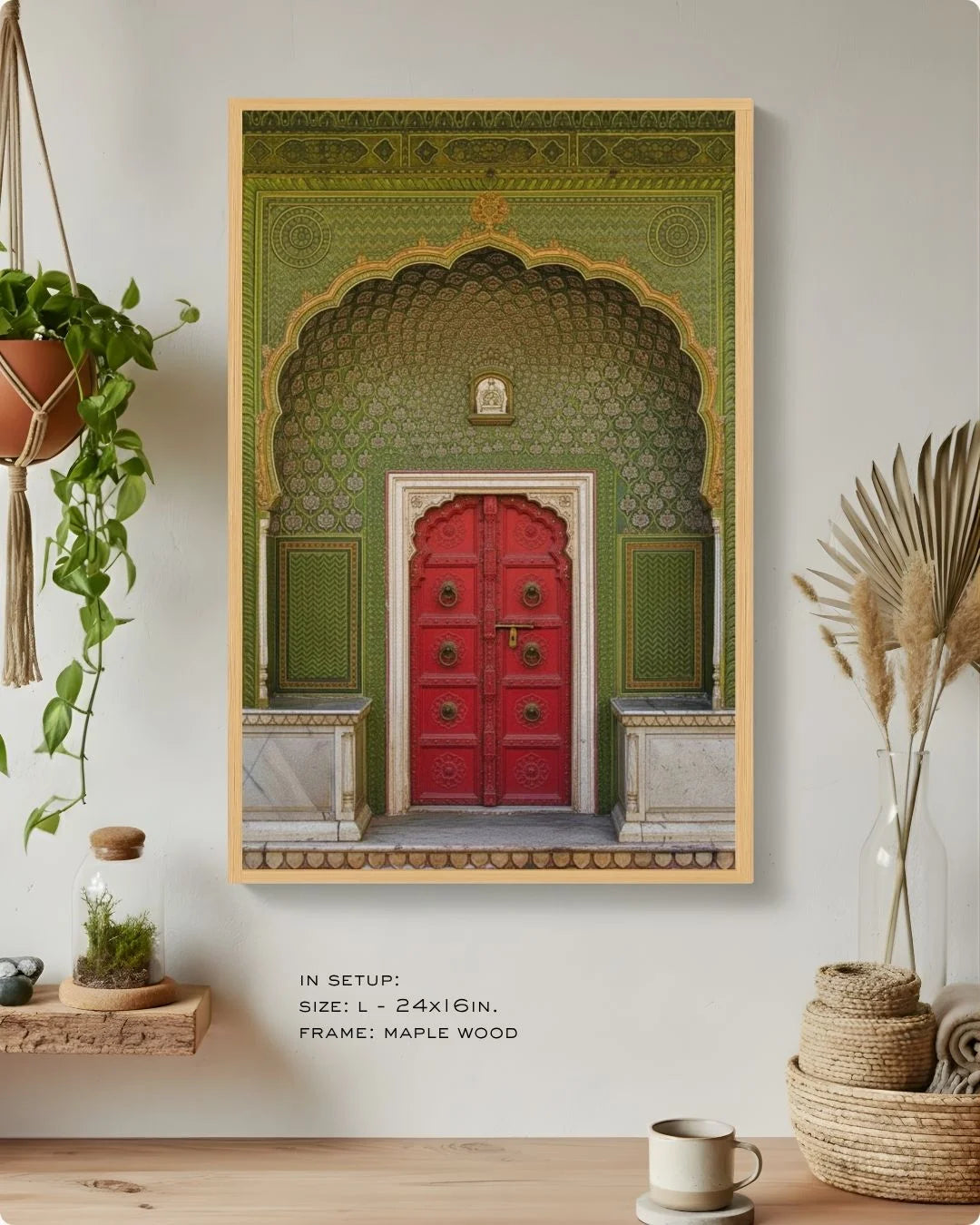 Close-up of the red Indian heritage door print in a Maple Wood frame, showcasing the vibrant contrast against a warm, neutral wall.
