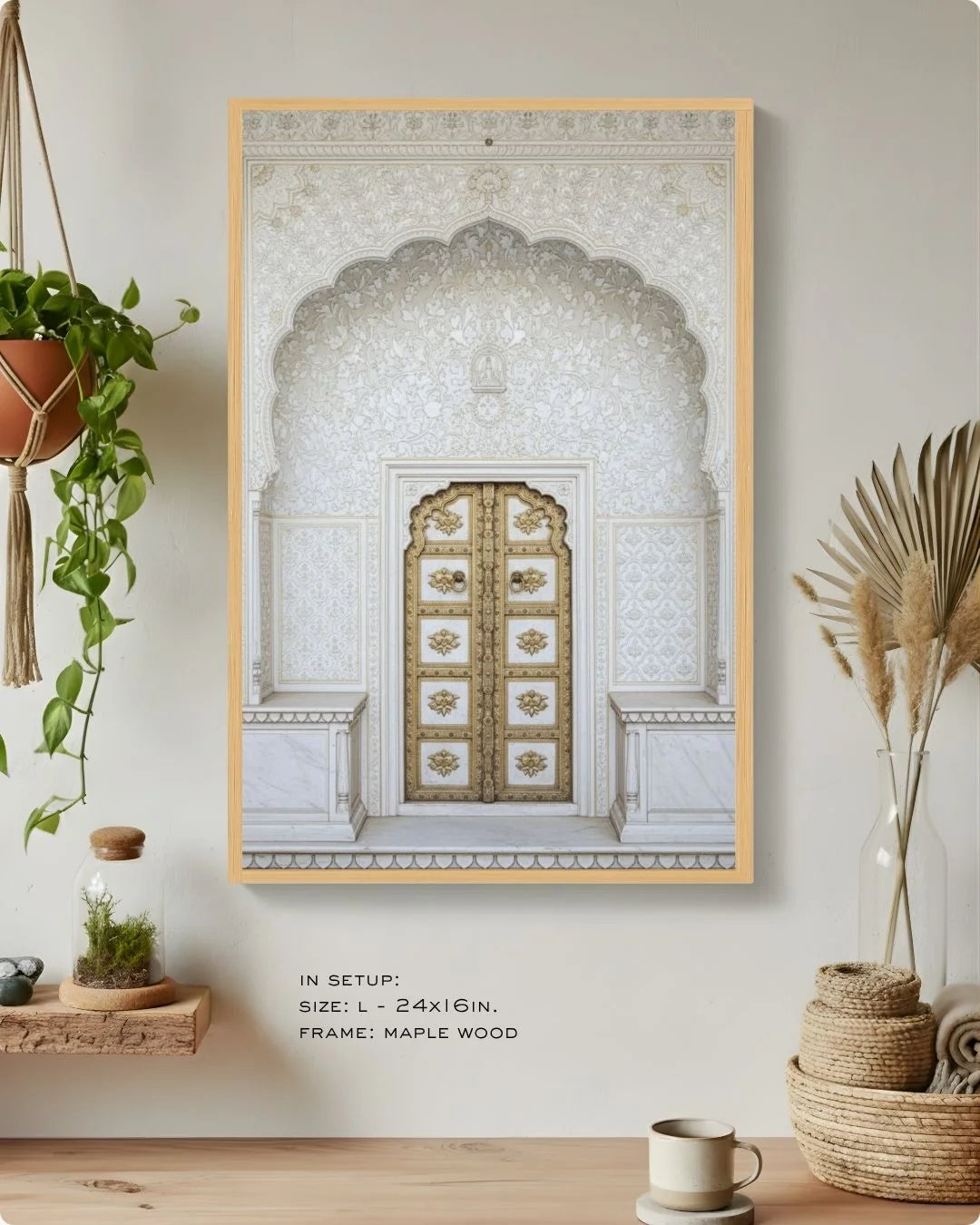 Close-up of the white marble and gold heritage doorway print in a Maple Wood frame, showcasing intricate carvings on a neutral wall.