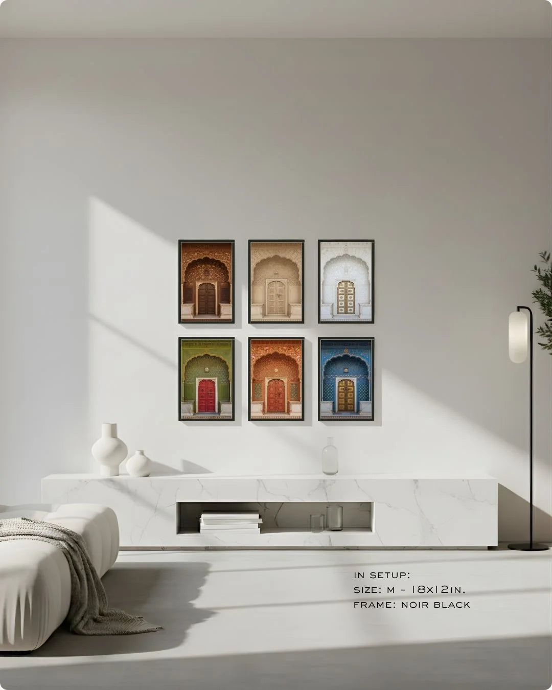 Medium (Size M) 6-piece heritage doorway art set in Noir Black frames, styled above a modern low TV console for scale comparison.