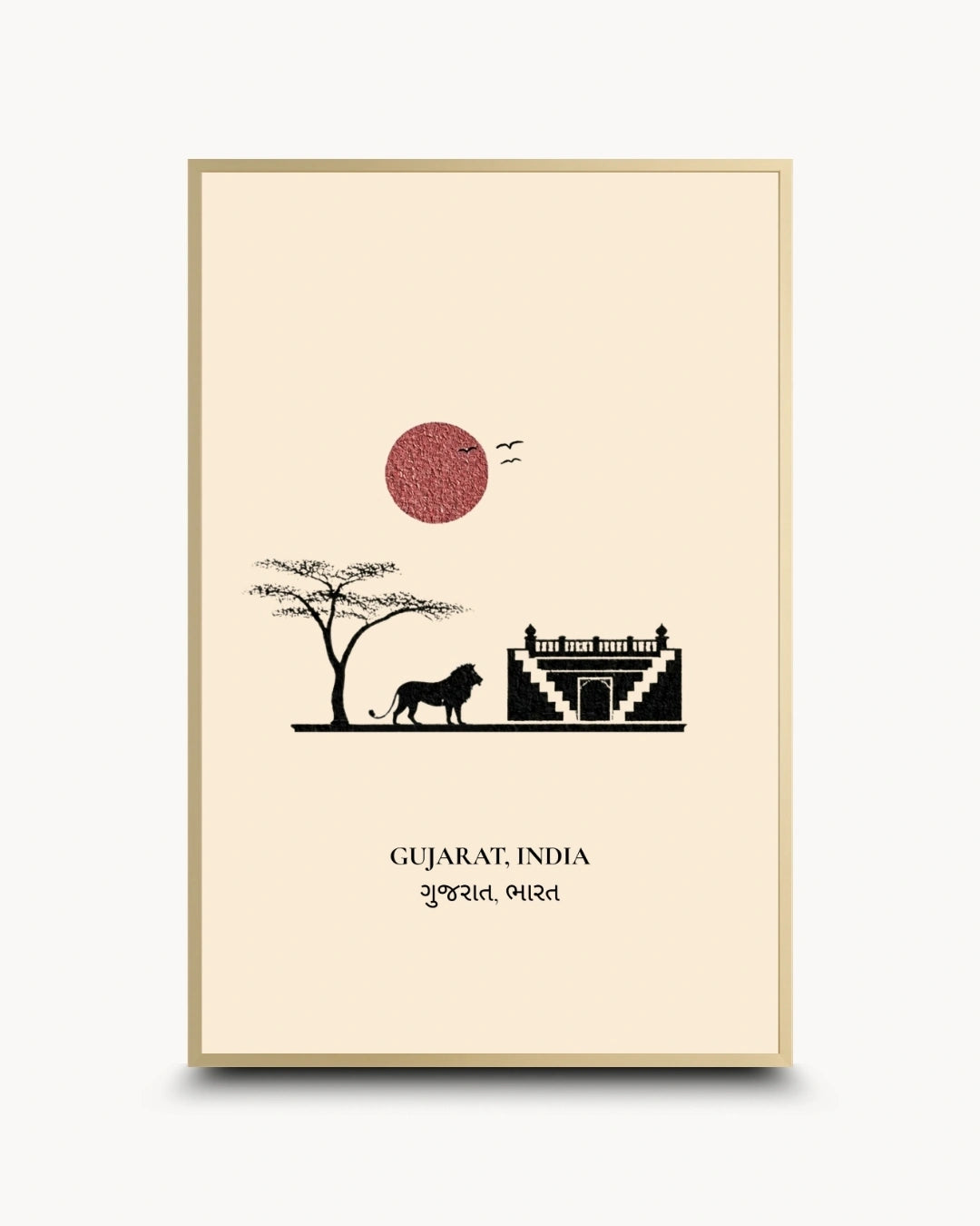 A framed art print featuring a minimalist illustration of Gujarat, India, with a black silhouette of a lion and tree, a red textured sun, and a white architectural structure on a cream background, enclosed in a thin gold frame.