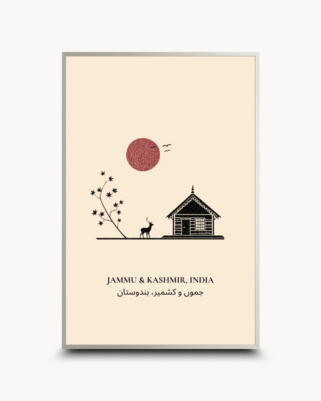 A framed minimalist art print featuring a cream background with a black line drawing of a house, a deer, a flowering branch, birds, and a textured dusty red sun. Below the illustration, the text reads 'JAMMU & KASHMIR, INDIA' in English and Arabic.