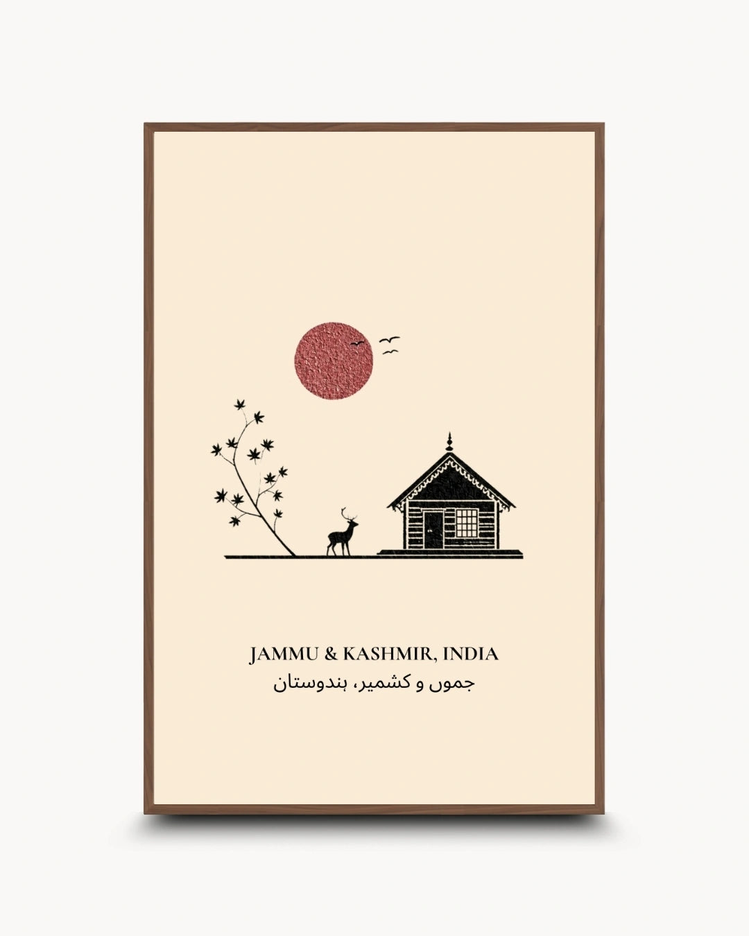 A vertical framed art print featuring a minimalist illustration of a house, a deer, a flowering branch, birds, and a red sun on a cream background, with the text 'JAMMU & KASHMIR, INDIA' and Arabic text below. The print is shown with a thin brown frame against a light gray background.