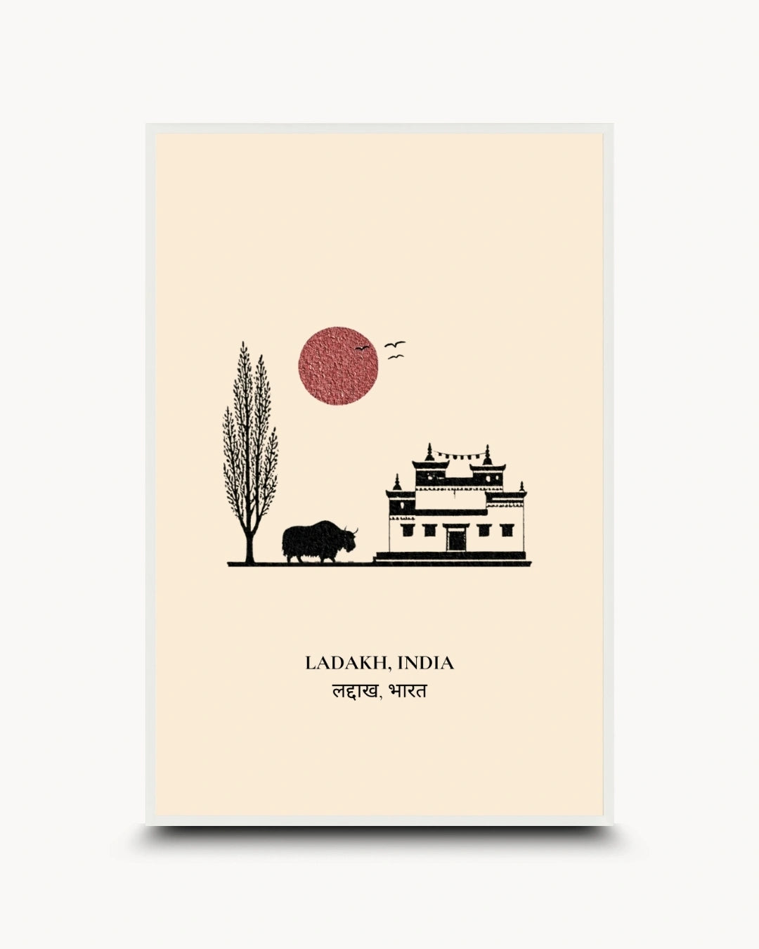 A minimalist travel art print of Ladakh, India, featuring a black line drawing of a traditional building, a tree, a bison, and a red sun on a cream background, with text below.