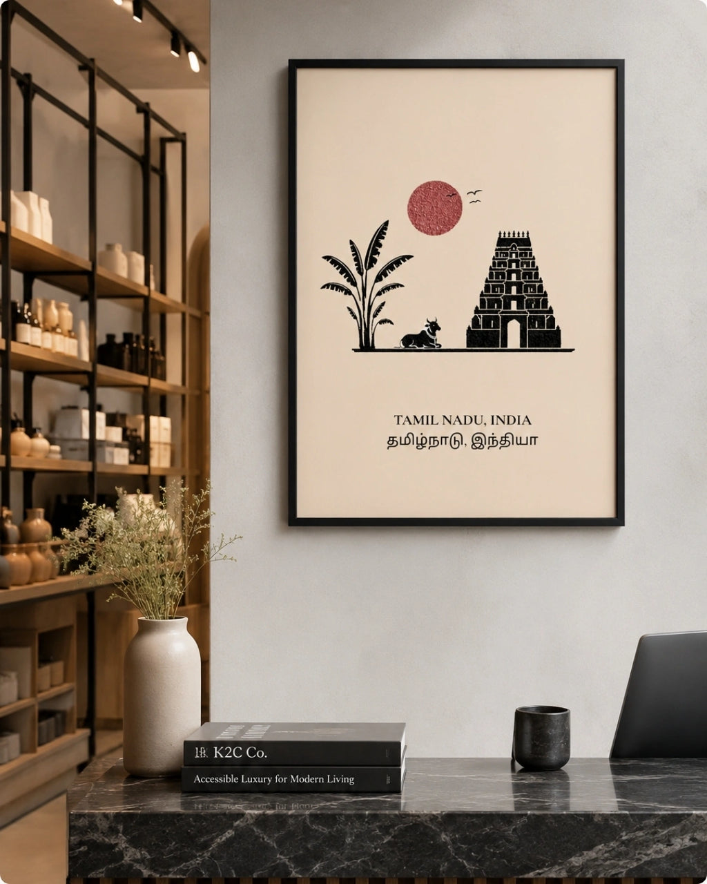 A framed vertical art print featuring a Tamil Nadu temple and landscape illustration, displayed on a wall in a modern interior setting.