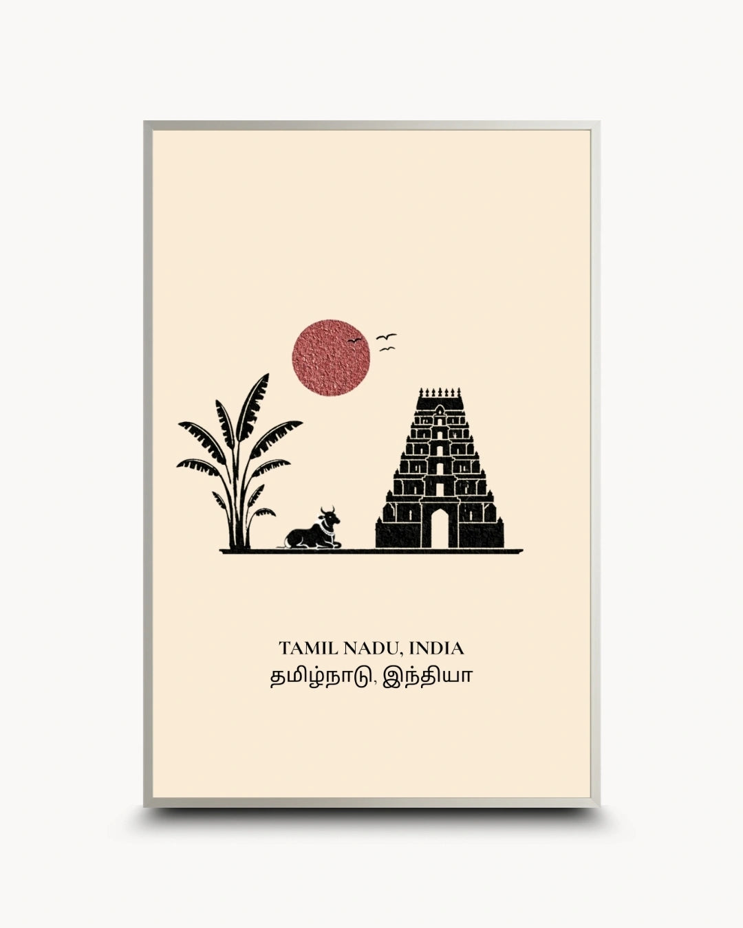 A framed minimalist art print featuring a black silhouette of a Tamil Nadu temple, a palm tree, a cow, and a red sun on a cream background, with the text 'TAMIL NADU, INDIA' and Tamil script below. The print is enclosed in a thin gold frame and shown against a light gray background.