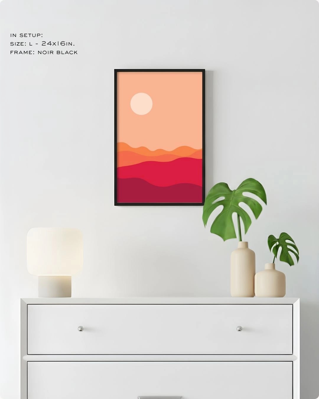 Large (Size L) Desert Dusk abstract landscape print by K2C Co. in a Noir Black frame, styled in a minimalist home setup above a white chest of drawers.