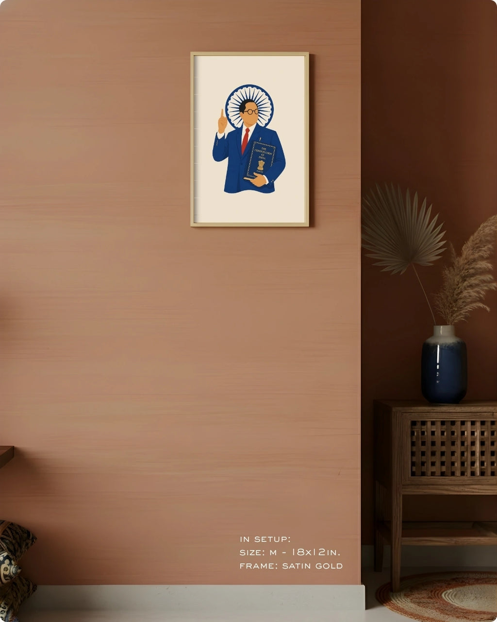 Visual size guide mockup for the Dr. B.R. Ambedkar wall art in Medium size with a satin gold frame displayed against a warm terracotta accent wall.