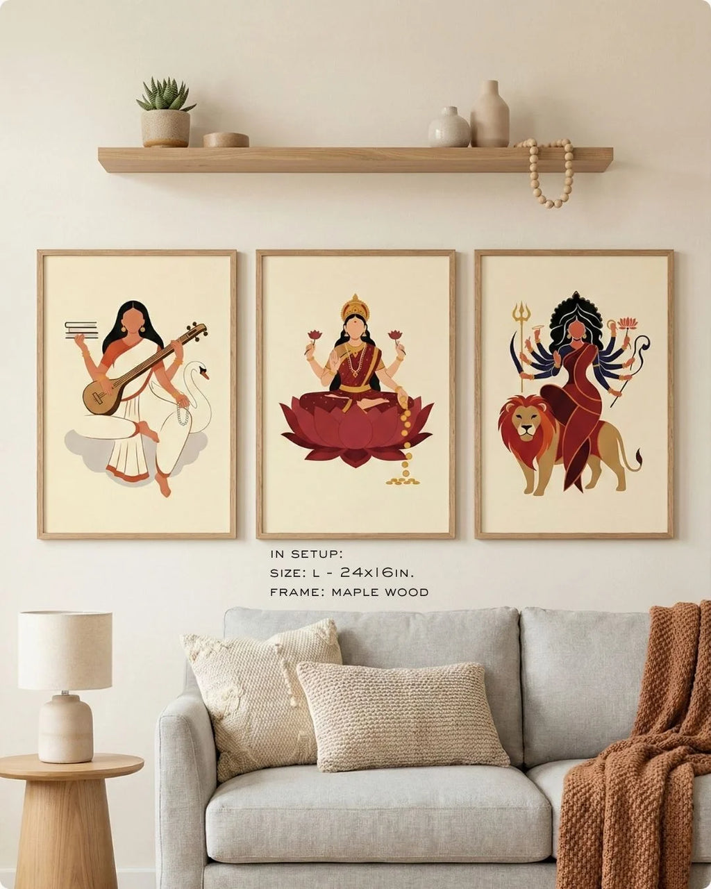 3-piece Divine Goddess collection featuring Saraswati, Laxmi, and Durga in Noir Black frames, styled over a modern wooden console table.