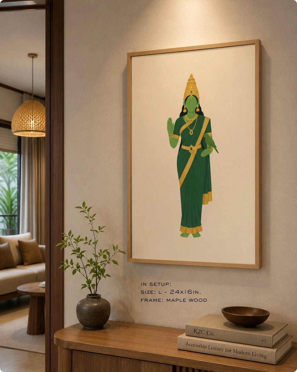 Lifestyle mockup of the minimalist Hindu Goddess Meenakshi wall art in a maple wood frame, displayed over a clean light wood console table in a bright, modern entryway.