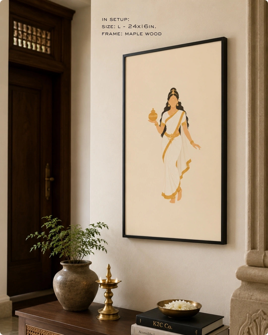 Lifestyle interior mockup of the Hindu Goddess Mohini wall art in a sleek black frame, hung near a dark wooden doorway above a traditional console adorned with brass decor.
