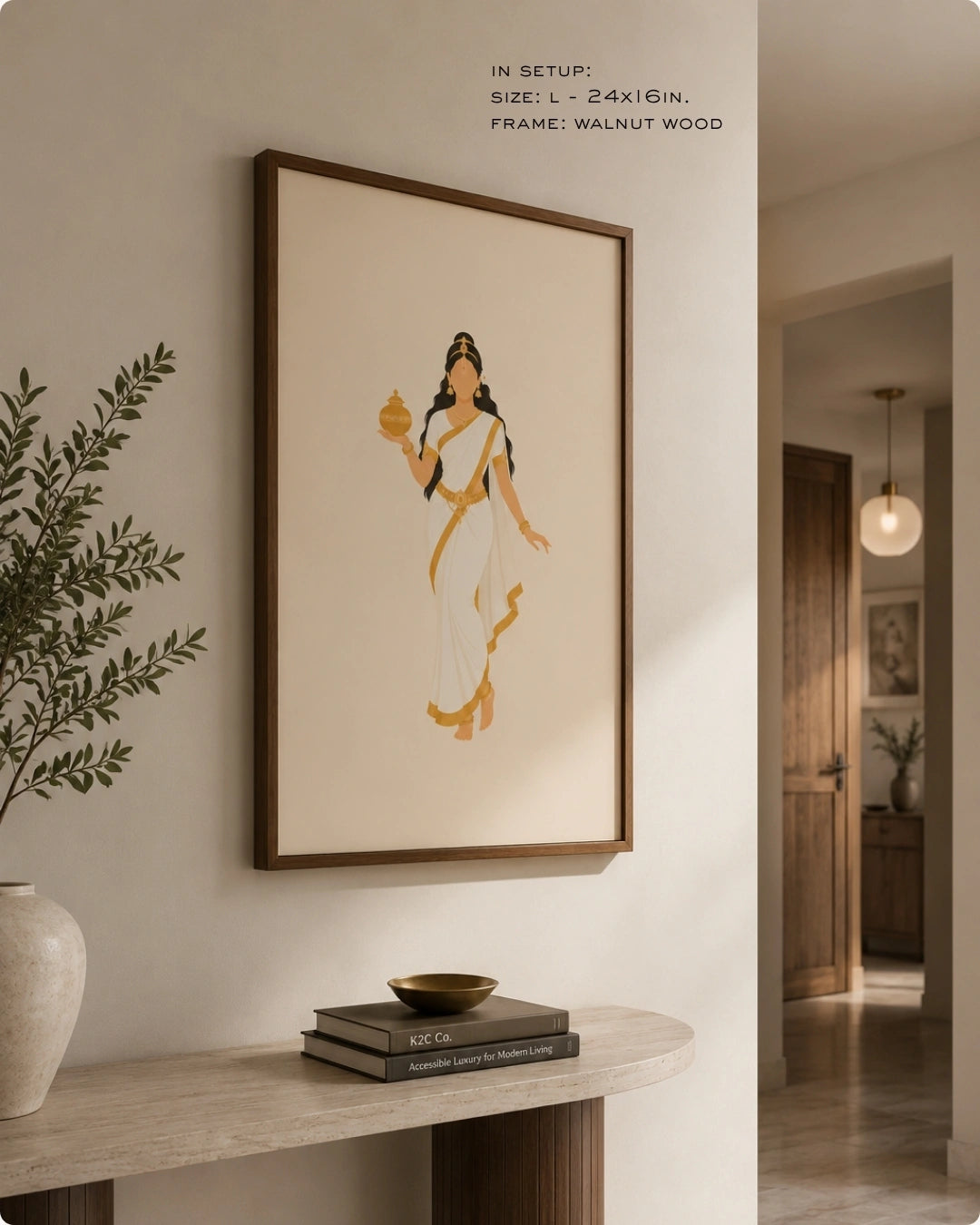 Lifestyle mockup of the minimalist Hindu Goddess Mohini wall art in a rich walnut wood frame, styled above a curved dark wood console with natural pottery.