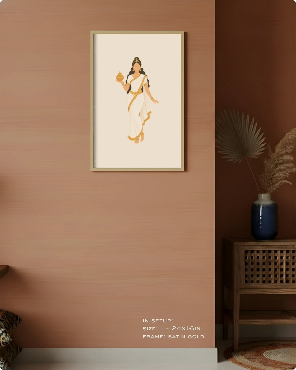 Visual size guide mockup for the Hindu Goddess Mohini wall art in Large size with a satin gold frame, displayed against a warm terracotta accent wall.