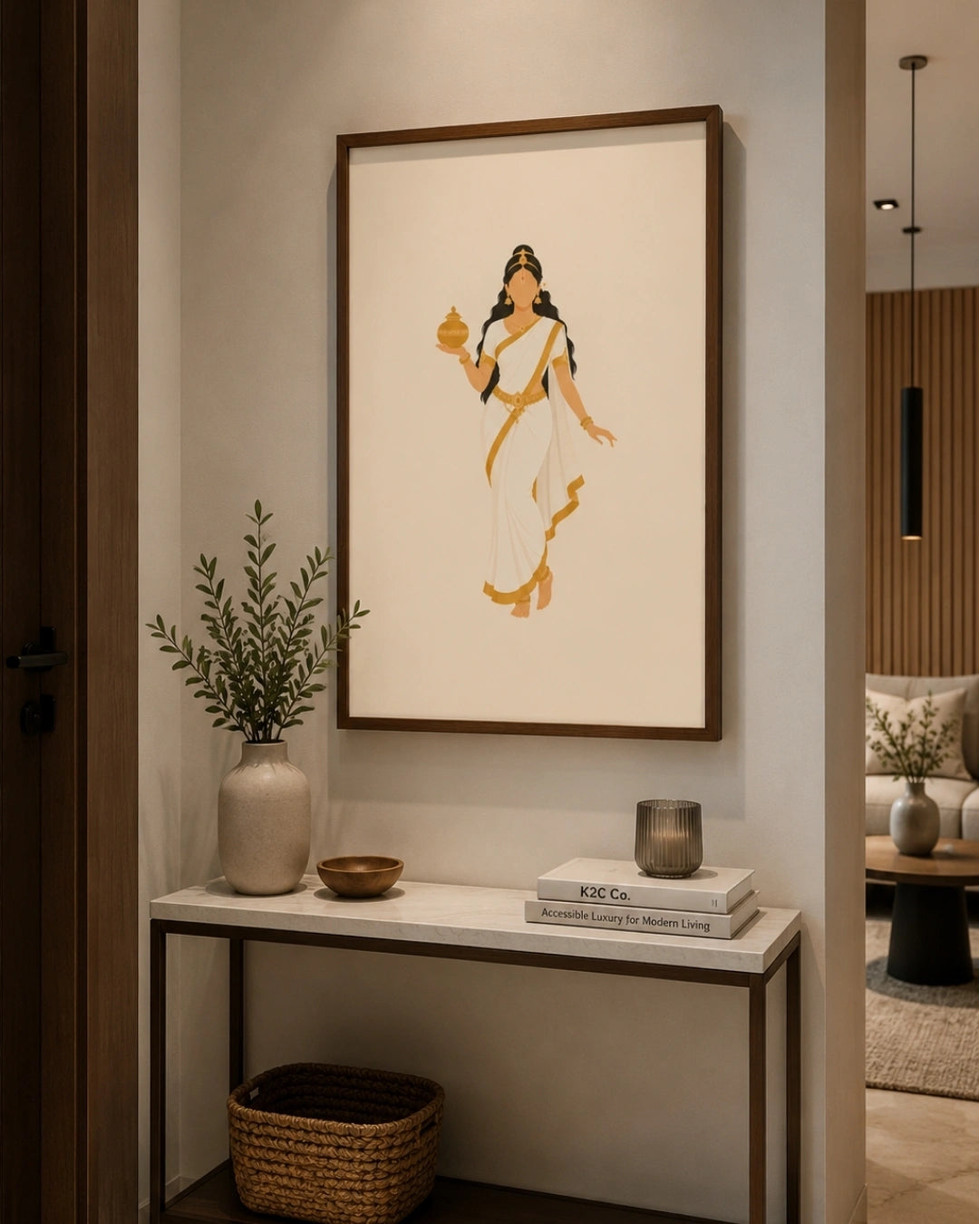 Lifestyle mockup of the minimalist Hindu Goddess Mohini wall art in a dark frame, perfectly centered above a clean minimalist entryway table in a contemporary hallway.