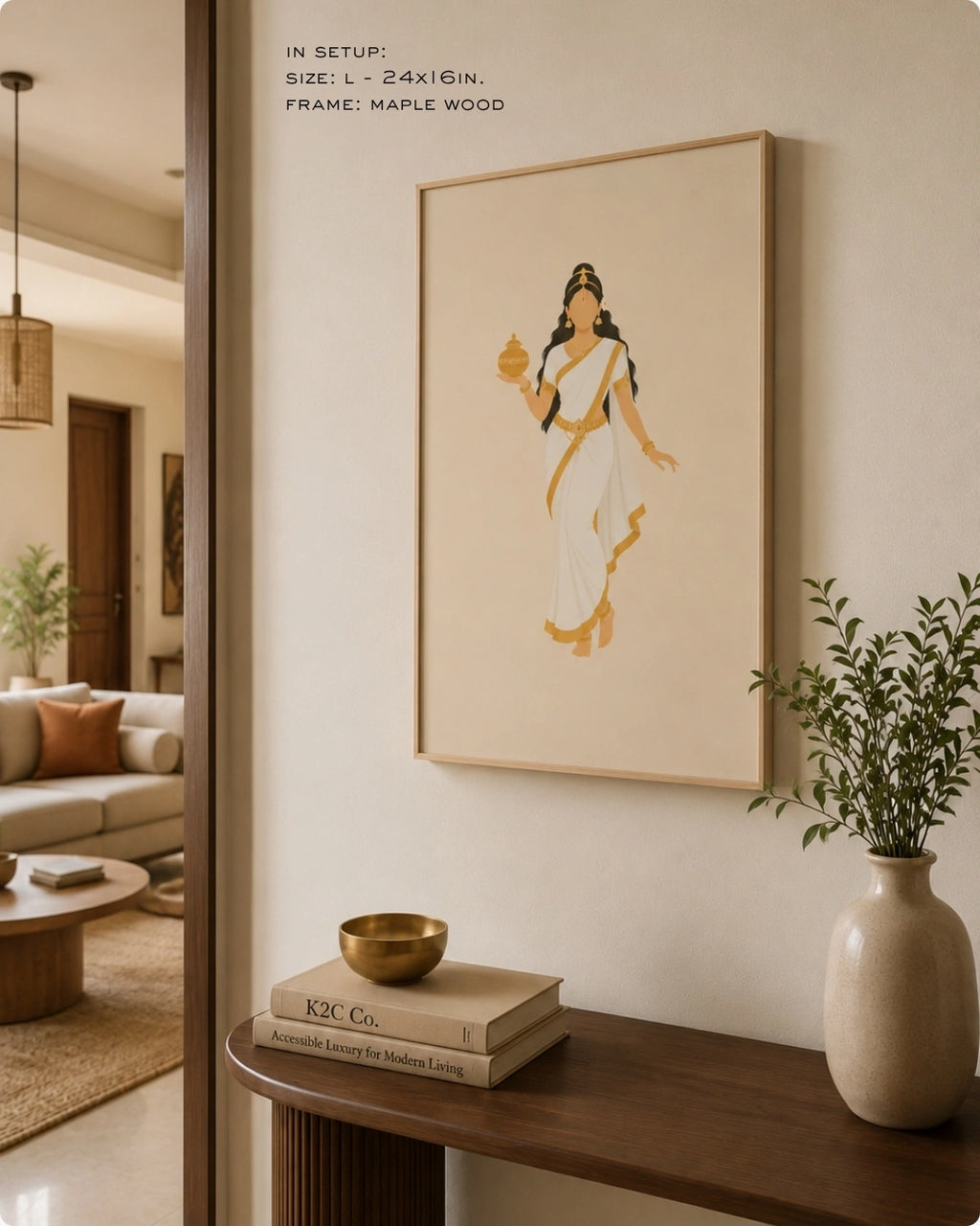 Lifestyle mockup of the minimalist Hindu Goddess Mohini wall art in a maple wood frame, displayed over a sleek stone console table in a bright, modern entryway.