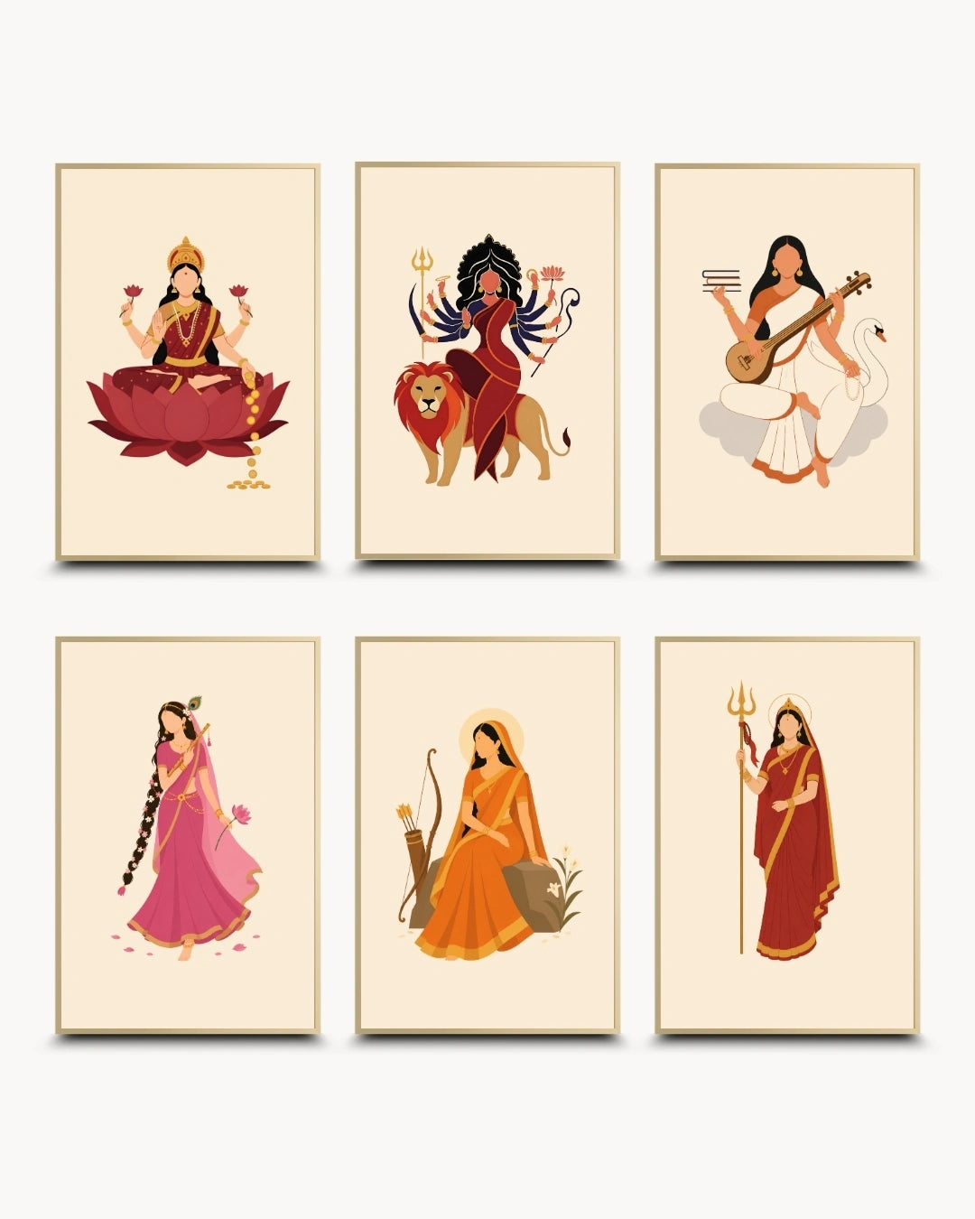 Six framed art prints arranged in a 2x3 grid on a light gray background. Each print features a stylized illustration of a woman in traditional Indian attire and garments, including a seated figure on a lotus, a lion-headed deity, a musician with a guitar, a figure in pink, a seated figure in orange, and a figure holding a trident. Minimalist illustration of Goddesses Lakshmi, Durga, Saraswati, Parvati, Sita, and Radha presented as a set of 6 modern wall art pieces in elegant satin gold frames.
