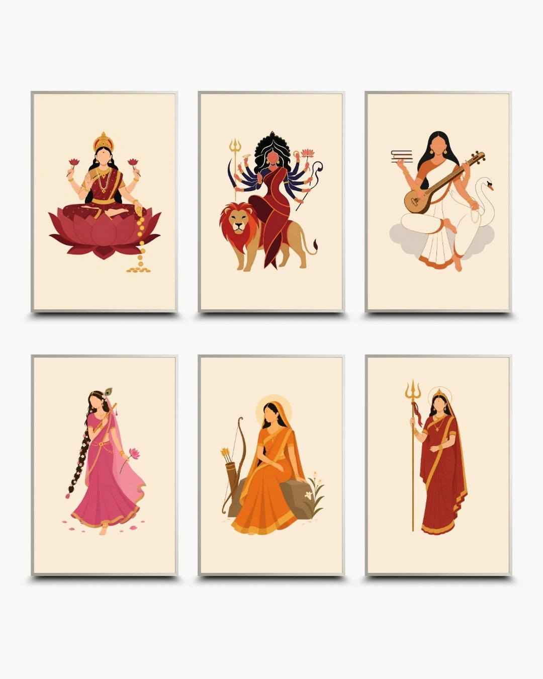 Six framed art prints arranged in two rows of three, each featuring a stylized illustration of a woman in traditional Indian attire and symbols on a cream background with light wood frames. Minimalist illustration of Goddesses Lakshmi, Durga, Saraswati, Parvati, Sita, and Radha presented as a set of 6 modern wall art pieces in modern satin silver frames.
