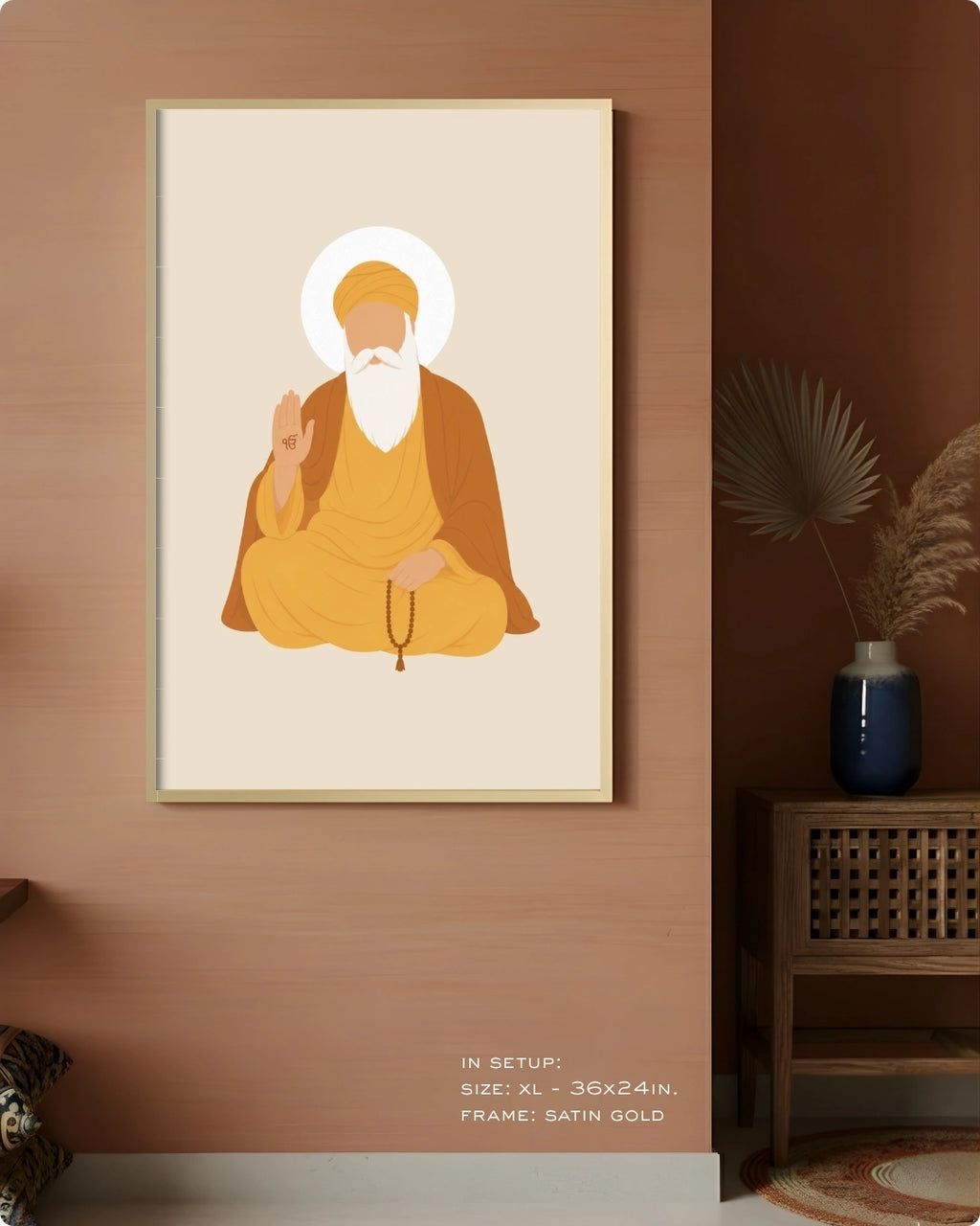 Visual size guide mockup for the Sikh founder Guru Nanak Dev Ji wall art in Extra Large size with a satin gold frame, displayed against a warm terracotta accent wall.