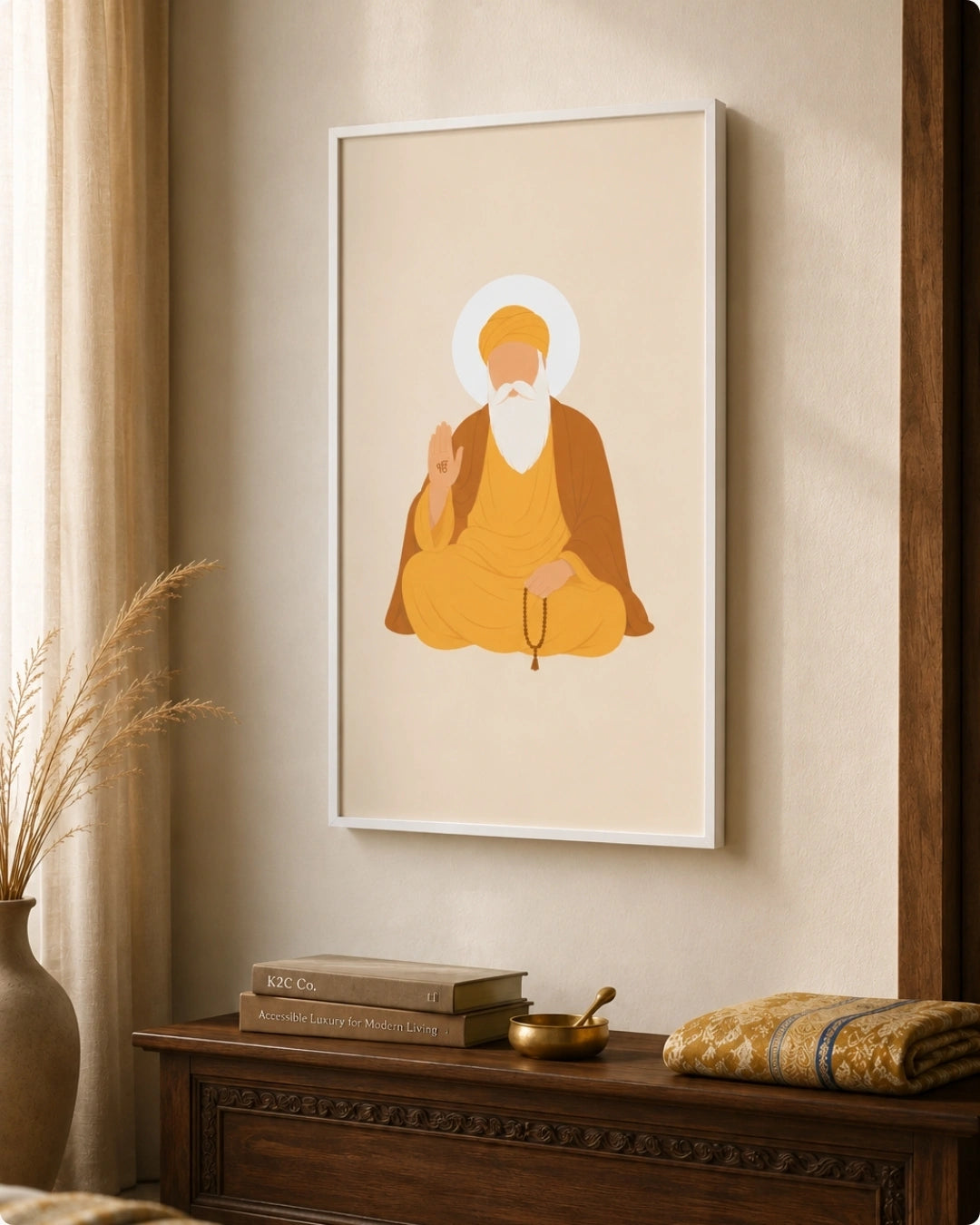Lifestyle mockup of the Sikh founder Guru Nanak Dev Ji wall art in a clean white frame, styled above a beautifully carved dark wooden chest alongside brass meditation items.