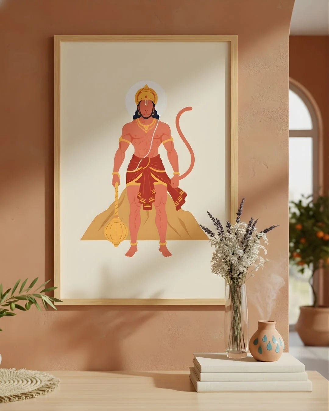 Close-up of the Hanuman divine illustration in a Satin Gold frame, showcasing the vibrant red and gold mountain motif against an earthy neutral wall.