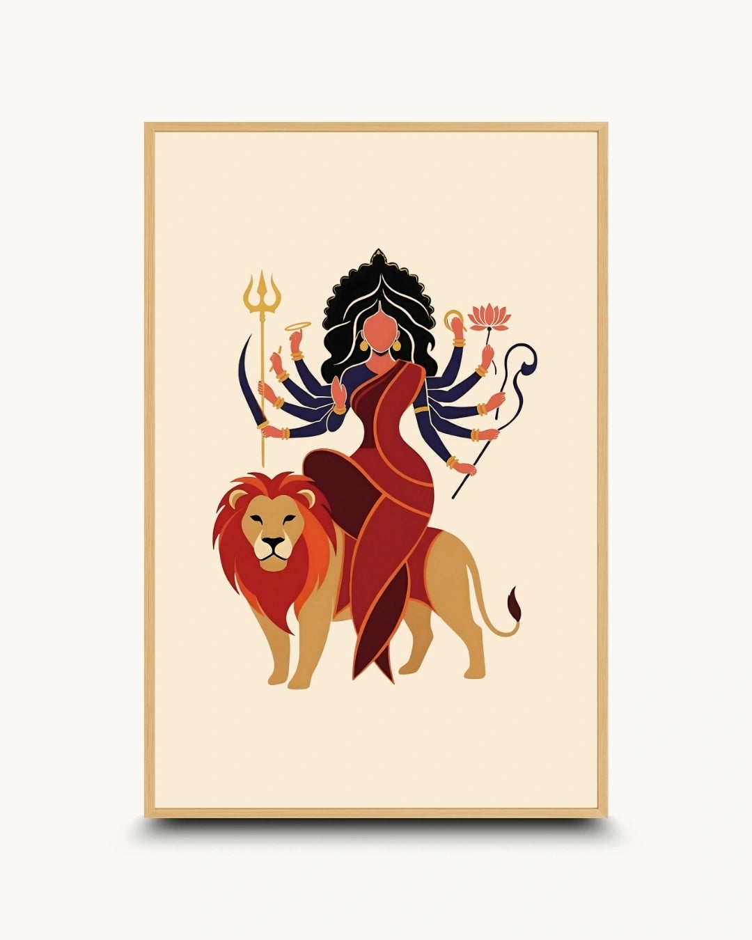 A framed art print featuring a stylized illustration of the Hindu goddess Durga riding a lion, rendered in warm beige, red, orange, and dark blue tones.