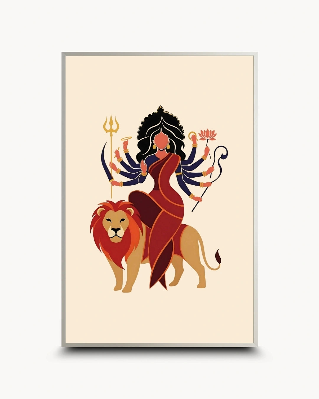 A vertical framed art print featuring a stylized illustration of the Hindu goddess Durga riding a lion, with a trident and lotus flower, on a cream background.