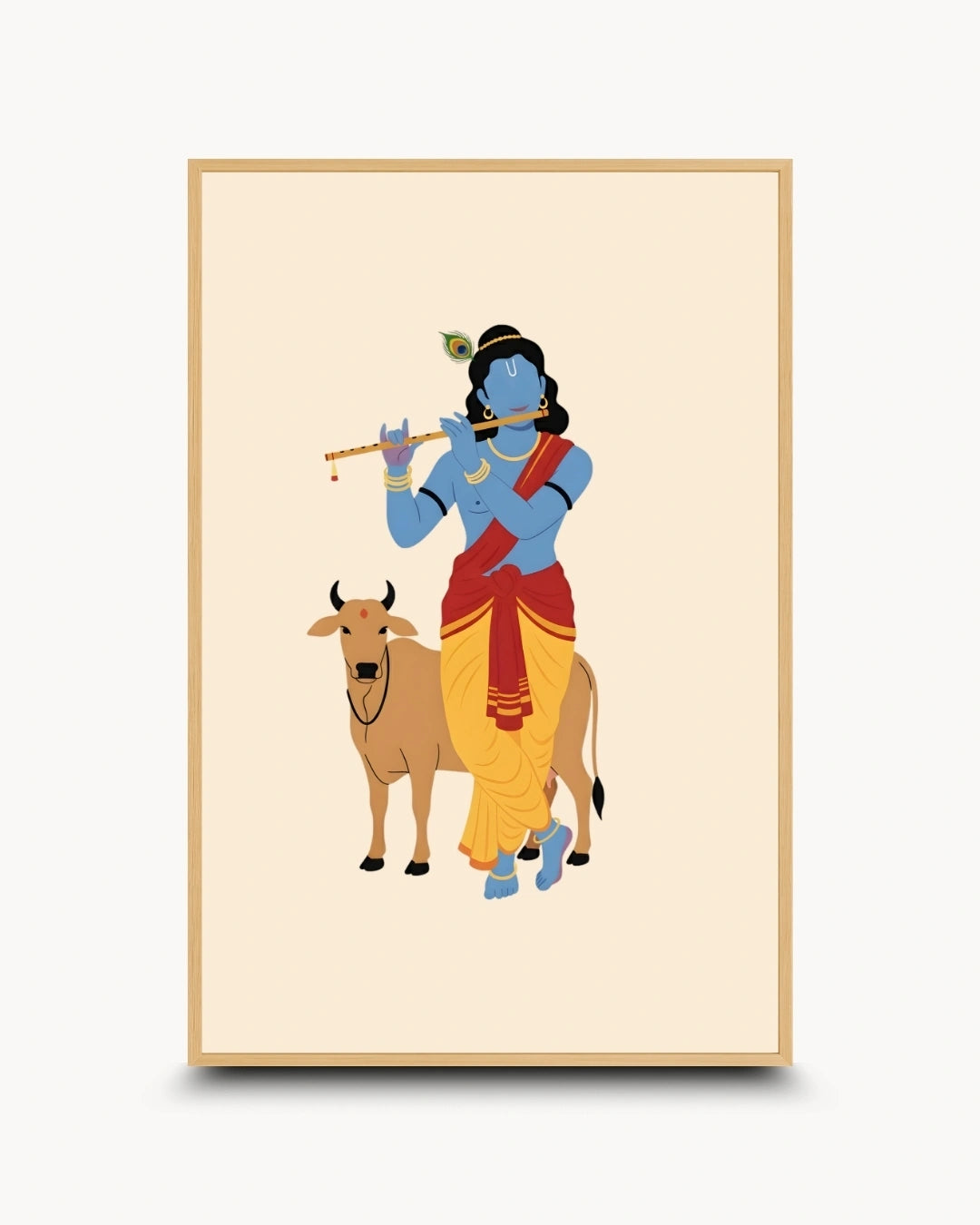 A framed art print featuring a stylized illustration of Lord Krishna playing a flute next to a cow, set against a cream background with a light wood frame.