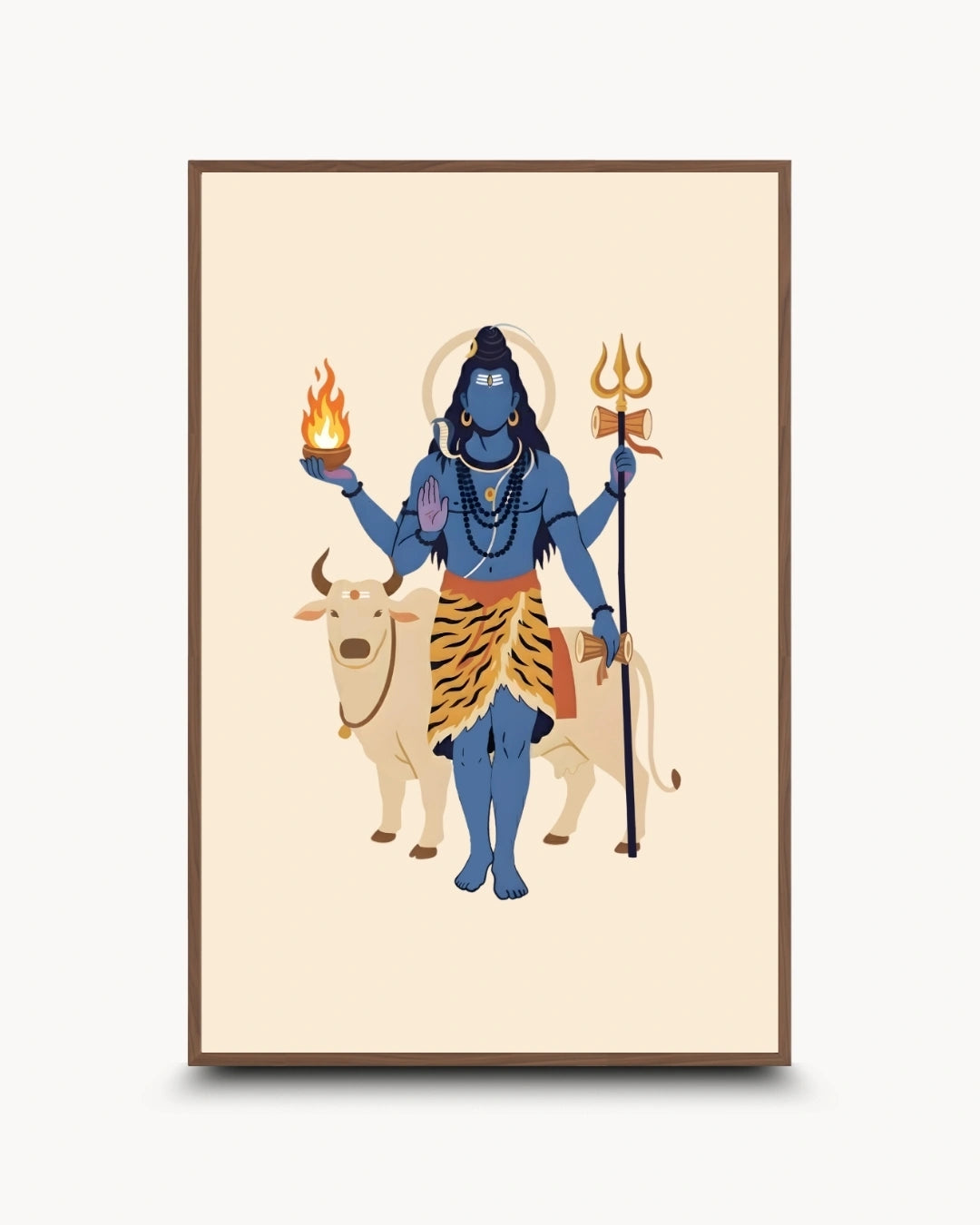 A framed art print featuring a stylized illustration of Lord Shiva standing on a white bull, holding a flaming mace and a trident, on a cream background with a brown frame.