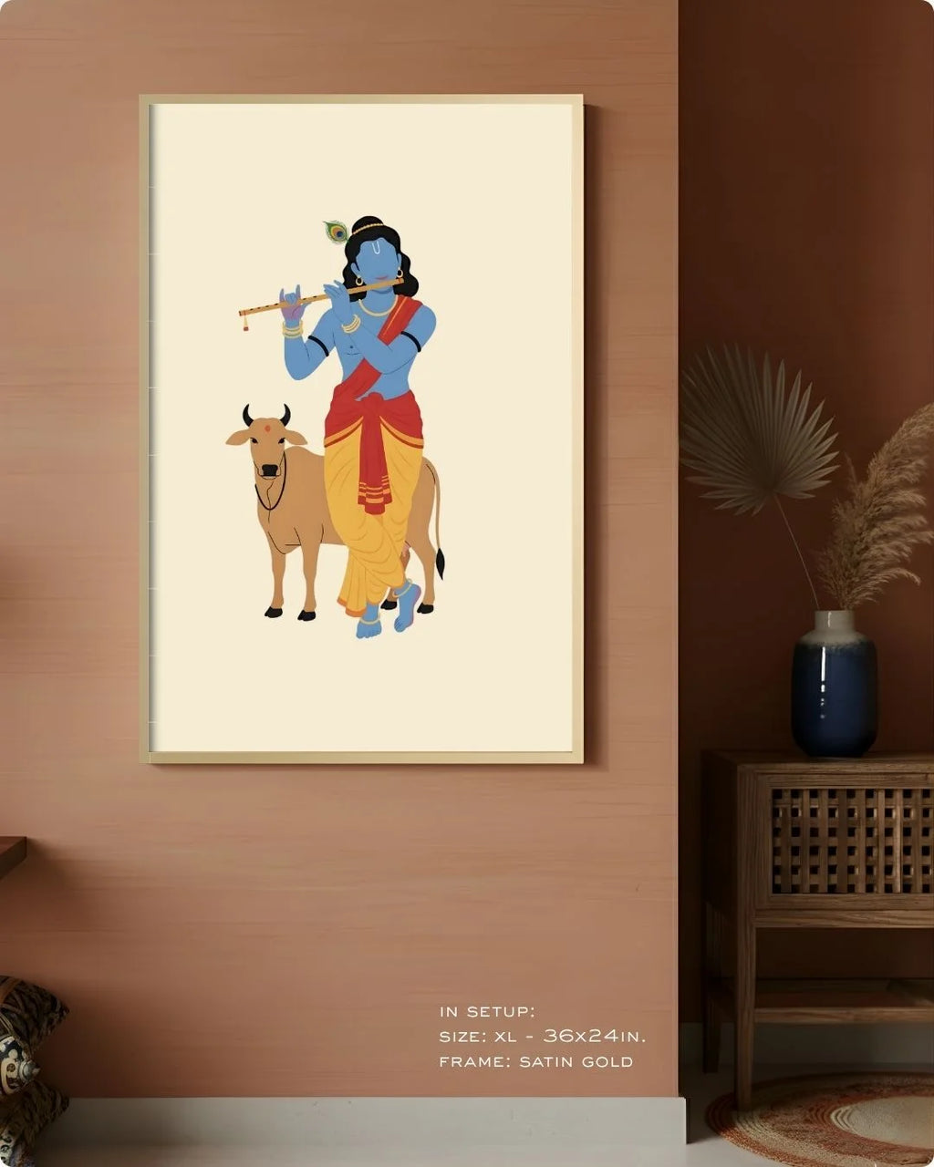 Extra Large (Size XL - 36x24in) Krishna divine print in a Satin Gold frame, demonstrating a monumental statement wall scale on a terracotta wall.
