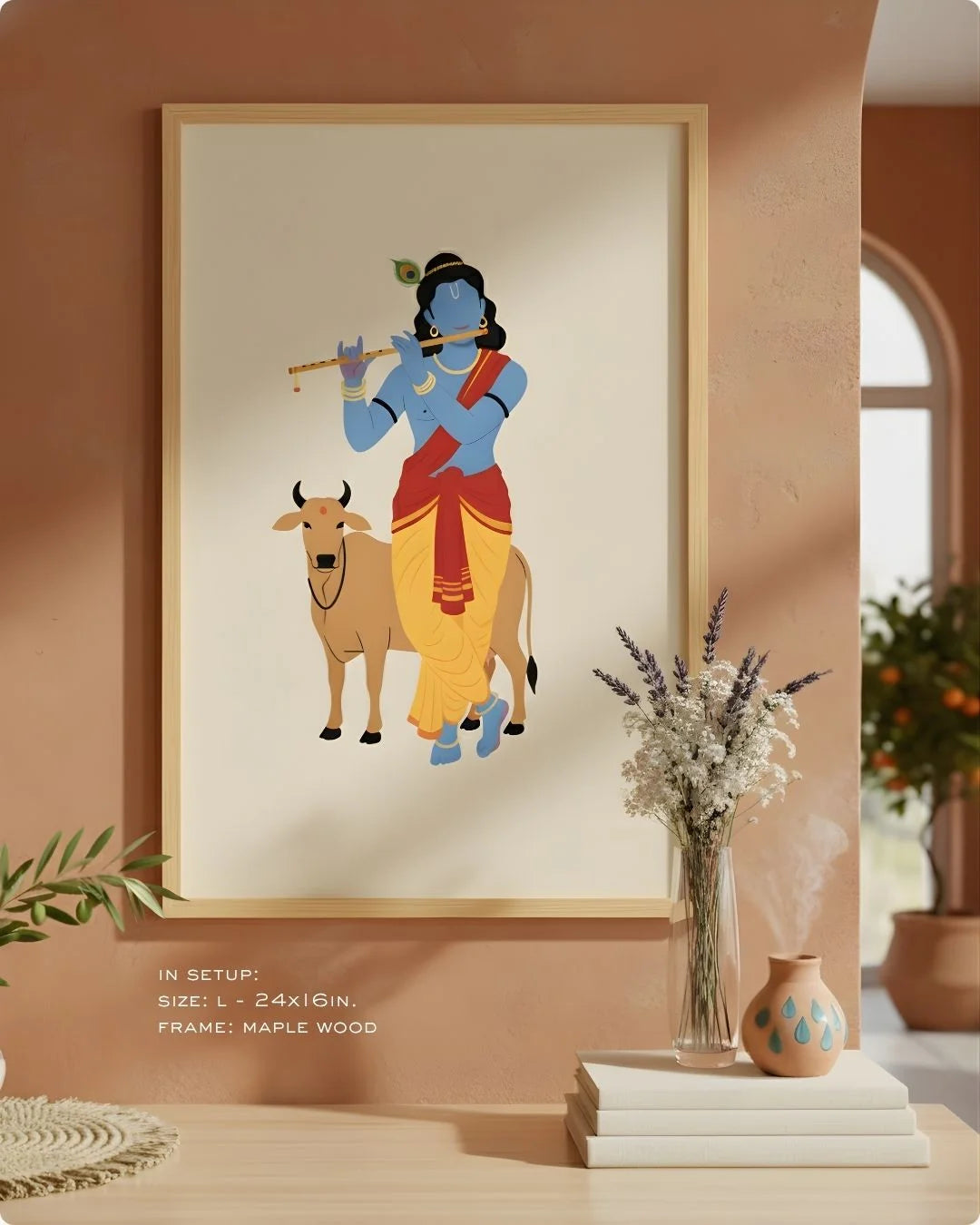 Close-up of the Krishna divine illustration in a Satin Gold frame, showcasing the blue silhouette and flute against an earthy neutral wall.