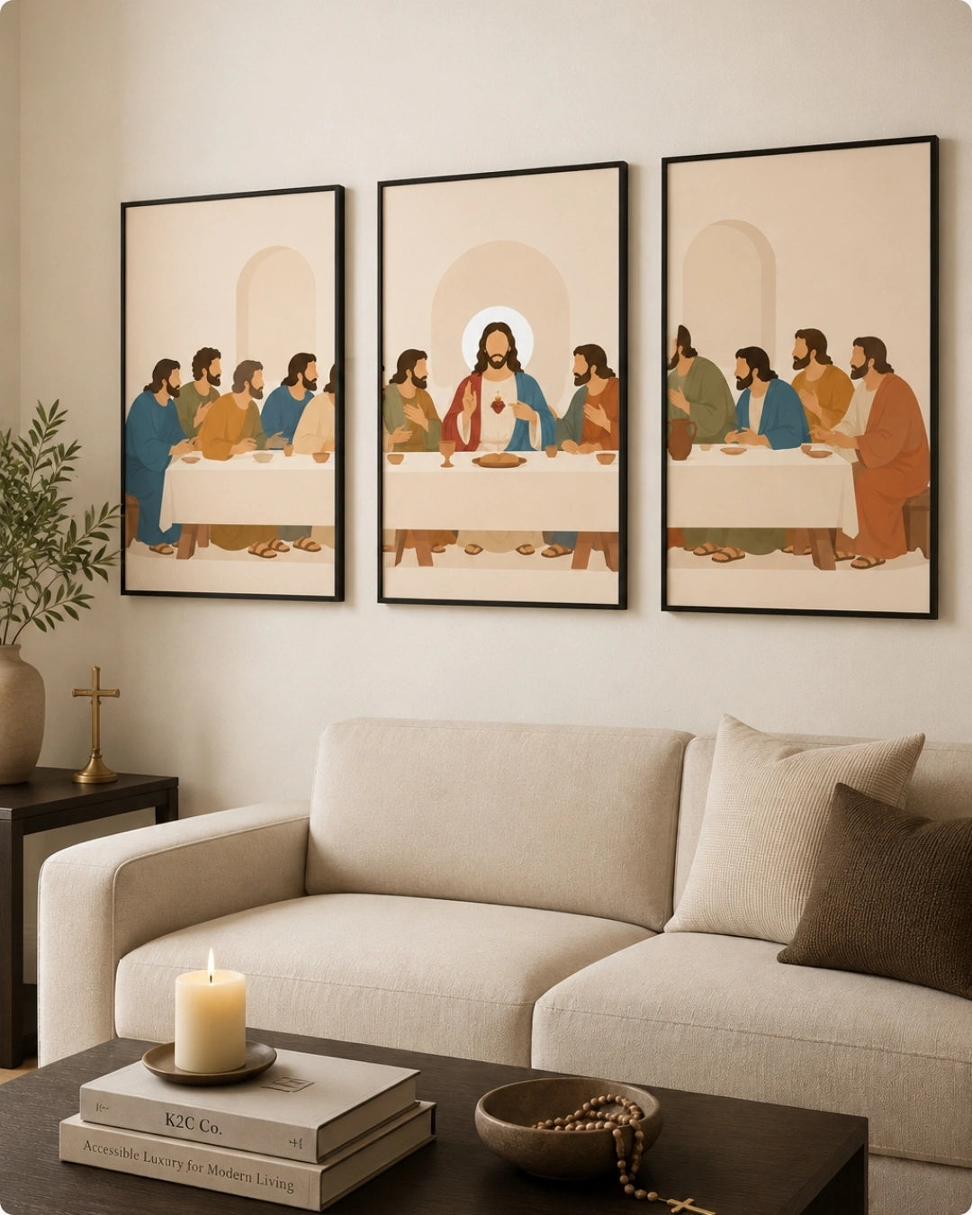 A three-panel framed wall art set depicting a stylized Last Supper scene, displayed above a light beige sofa in a modern living room setting.