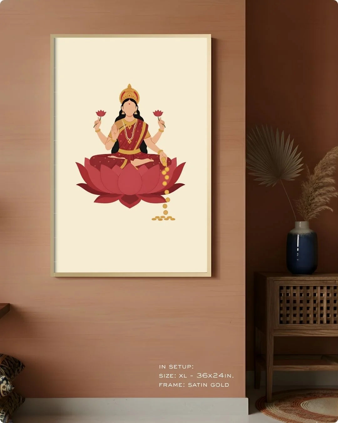 Extra Large (Size XL - 36x24in) Laxmi divine print in a Satin Gold frame, demonstrating a monumental statement wall scale on a terracotta wall.