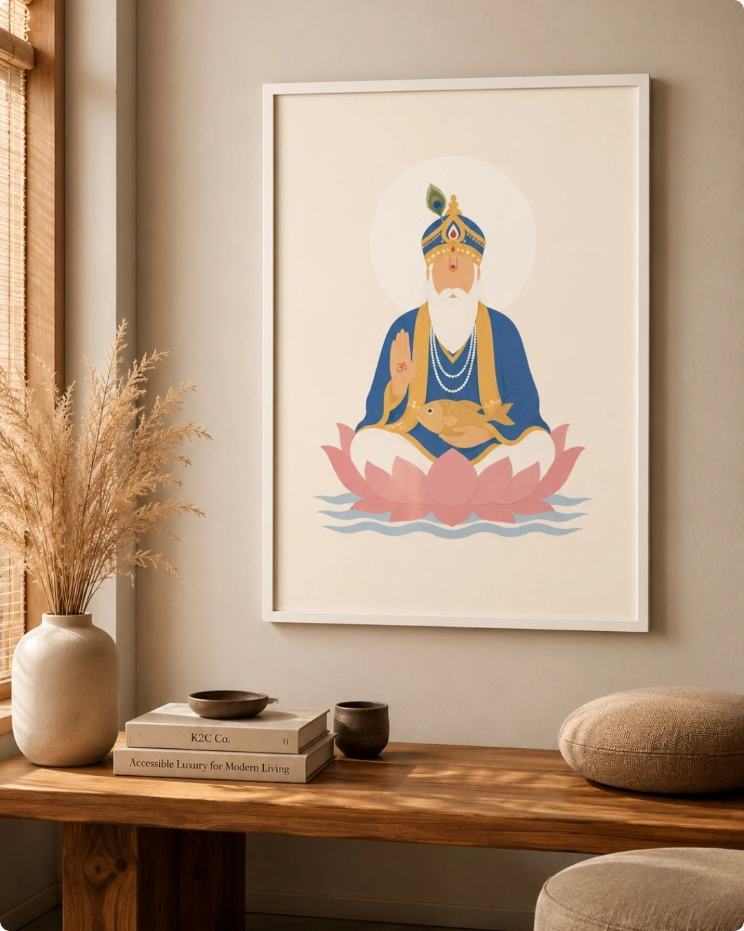 Lifestyle interior mockup of the Lord Jhulelal wall art in a clean white frame hung over a natural wood bench styled with dried pampas grass.