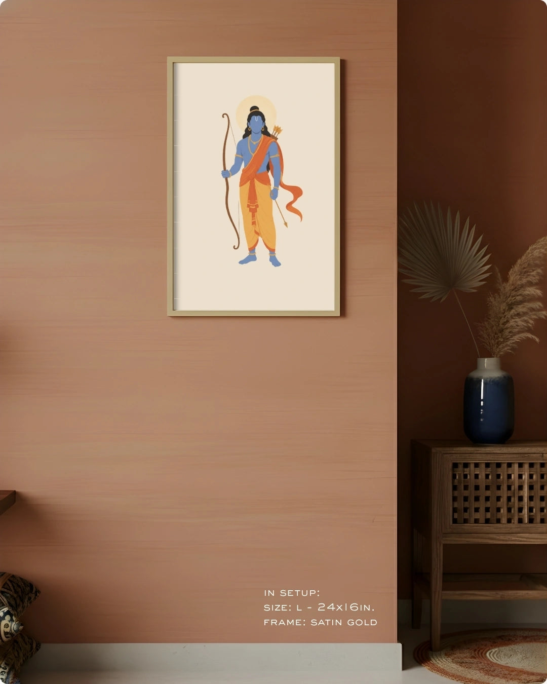 Visual size guide mockup for the Hindu deity Lord Rama wall art in Large size with a satin gold frame, displayed against a warm terracotta accent wall.