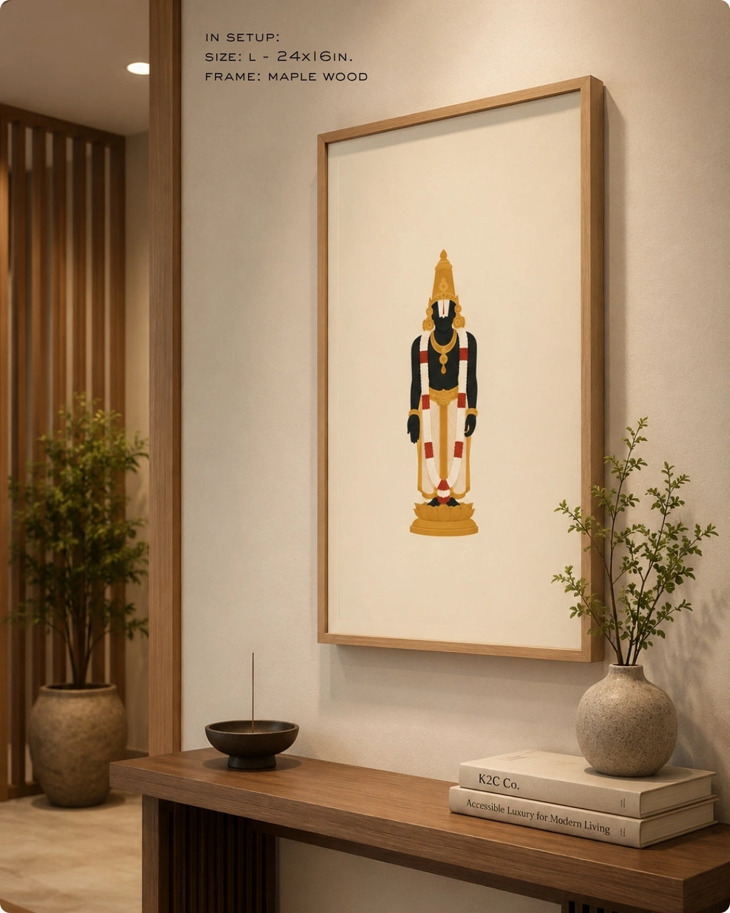 Lifestyle mockup of the minimalist Hindu deity Lord Venkateswara wall art in a maple wood frame, displayed over a clean wooden console table in a warm entryway.