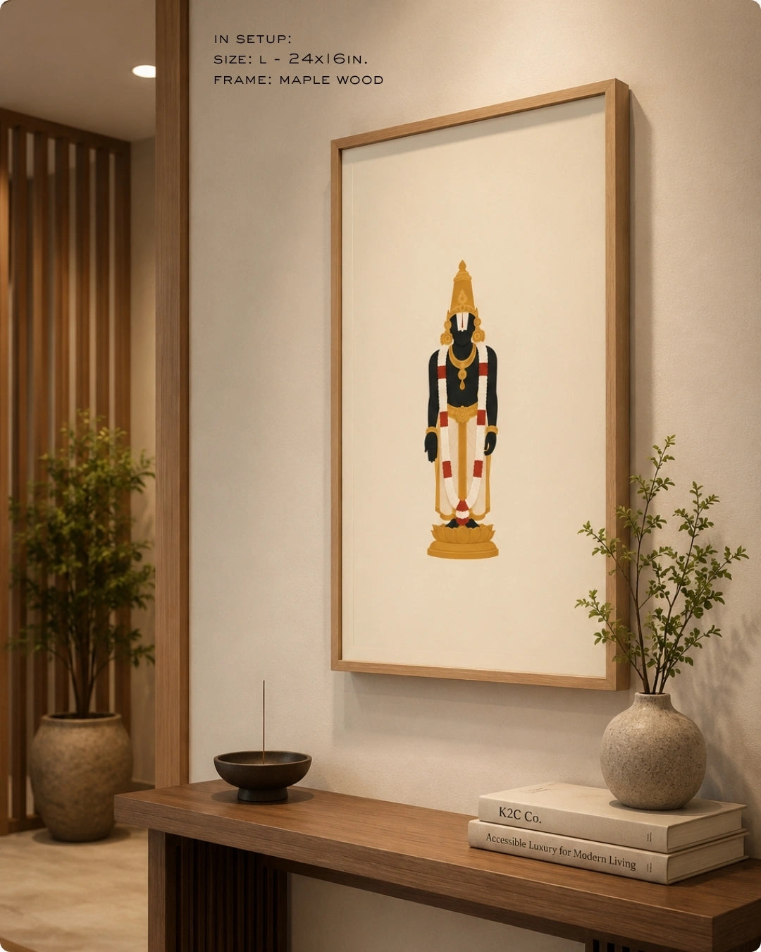 Lifestyle mockup of the minimalist Hindu deity Lord Venkateswara wall art in a maple wood frame, displayed over a clean wooden console table in a warm entryway.